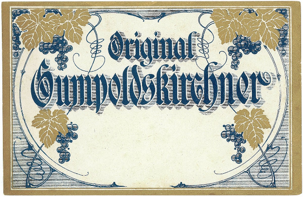 Ein altes deutsches Wein-Etikett mit einer Illustration von Trauben und Blättern und einem Text, der die Art des Weins angibt.