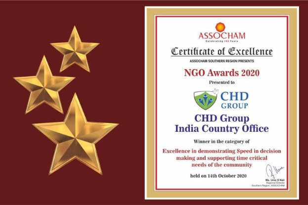 Auszeichnung für die NGO Awards 2020 mit "Chd Group India Country Office"-Text und einem Schild-Logo mit einem zentralen Stern und Lorbeerkranz, begleitet von drei Sternen links.